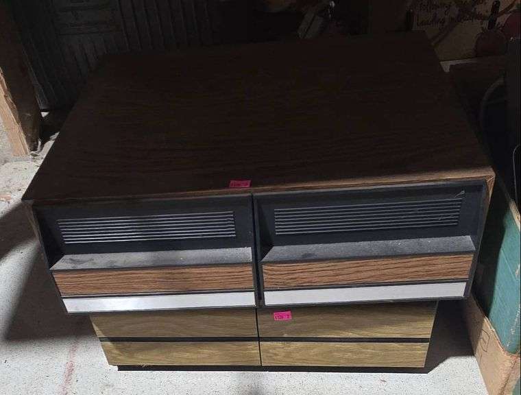 Two Media Storage Units With VHS Tapes