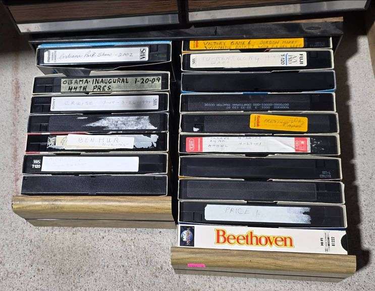 Two Media Storage Units With VHS Tapes
