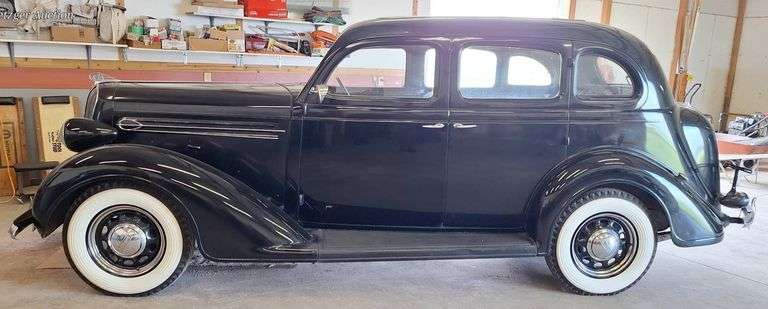 1936 Plymouth P2 Deluxe Sedan with Black Finish and Whitewall Tires, Runs and Drives, 36,000 miles, has title, VIN 2979368 - A $25 TITLE FEE WILL BE ADDED TO THE WINNING INVOICE