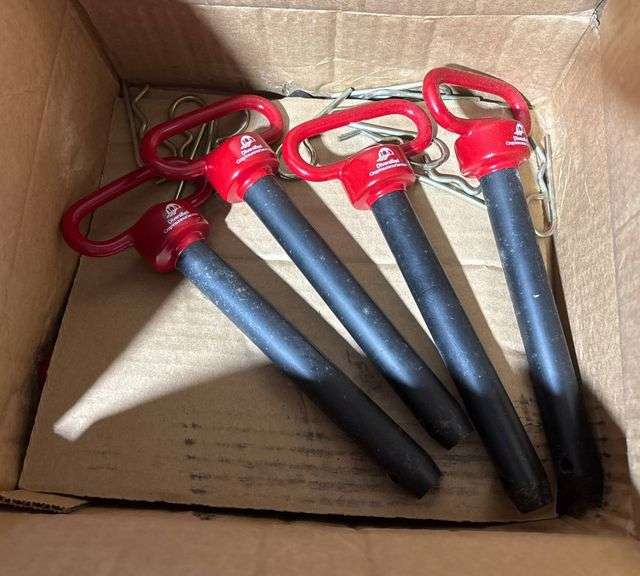 Ten Ground Anchors with Red Handles and Metal Stakes