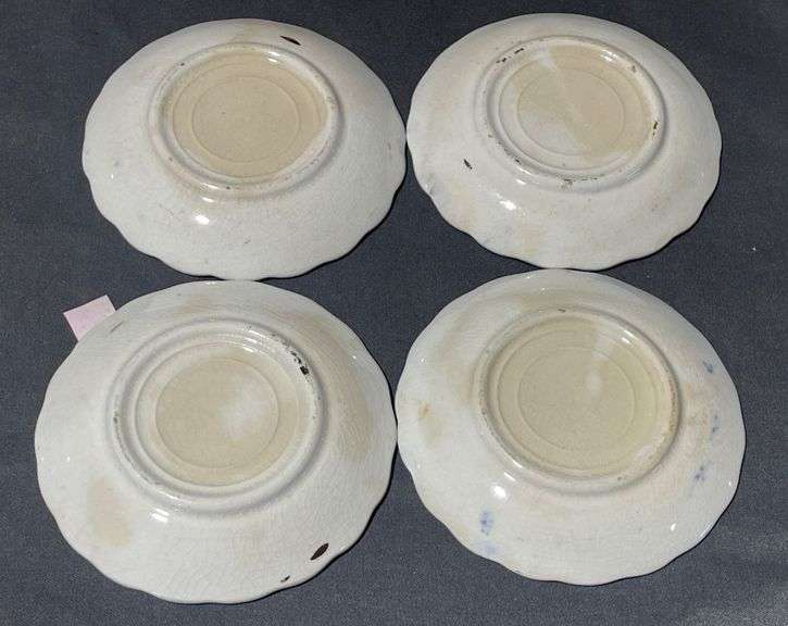 Four Porcelain Flow Blue Butter Pats, 6″