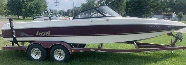2000 Tige 22I Performance-Driven Ski Boat, 379 hours, runs, well maintained, garage kept, comes with a trailer, boat has title, BOAT VIN TIXE3855B000 - A $25 TITLE FEE WILL BE ADDED TO THE WINNING INVOICE