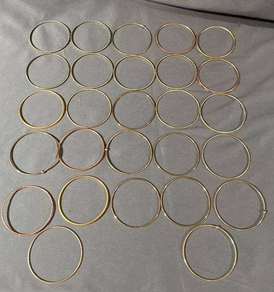 27 Gold-Tone and 17 Silver-Tone Bangles