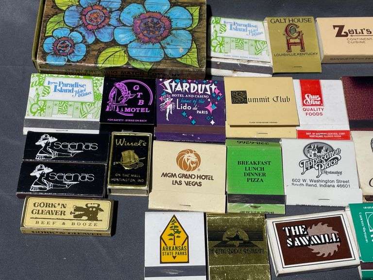 Matchbooks with Various Business Logos and Designs Including Cork’ N Cleaver, Arkansas State parks & Tippecanoe Place South Bend Indiana