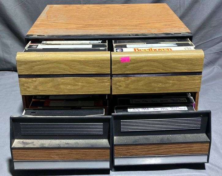 Two Media Storage Units With VHS Tapes
