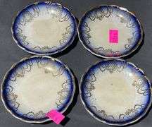 Four Porcelain Flow Blue Butter Pats, 6″