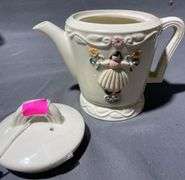 Porcelier Teapot with Embossed Floral and Girl Motif, 8×6″