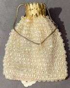 Four Evening Bags with Beaded, Mesh, and Metallic Designs
