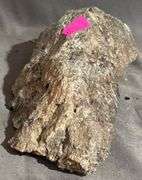 Rough Mineral Specimen with Metallic Inclusions