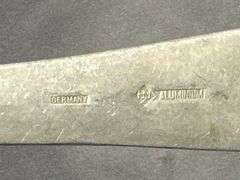 Two Long-Handled Metal Spoons, One Marked ‘Germany’, 13.5″ and 15″ Long