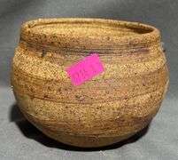 Handcrafted Planter with Textured Surface and Marked Base