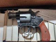 Hardcover and Paperback Books with Marx Toy Cap Gun