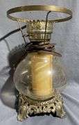 Books, Framed Quote, Glass Candlestick, and Table Lamp Parts