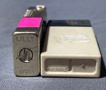 Camel & Jack Daniels Novelty Cigarette Lighters Featuring Branding and Graphics