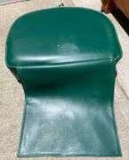 Upholstered Recliner & Barbers Booster Seat for a Child