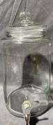 Two Clear Glass Beverage Dispensers with Spigots and Lids
