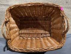 Three Handwoven Baskets in Varying Sizes and Styles