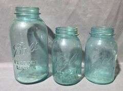 Glass and Plastic Containers With Flashlight and Cigar Box