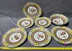 Asian Motif Porcelain Plates and Bowl with Floral and Geometric Patterns