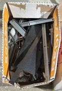 Hardware and Trash Bags in Mixed Condition