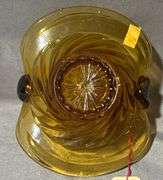 Amber Glass Basket with Swirled Base and Handle, 6x5x5″