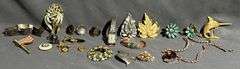 Jewelry and Accessories Featuring Brooches, Earrings, and Bracelets