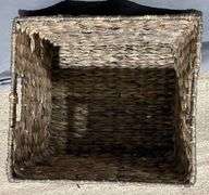 Three Handwoven Baskets in Varying Sizes and Styles