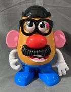Batman Action Figure by Mattel and Mr. Potato Head Toy