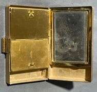 Gold-Tone Metal Compact Handbag with Black Fabric Handle