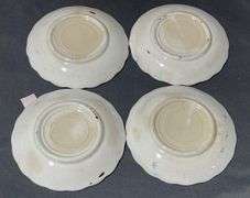 Four Porcelain Flow Blue Butter Pats, 6″