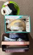 Household Items Including Books, Puzzle, and Display Accessories