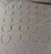 27 Gold-Tone and 17 Silver-Tone Bangles