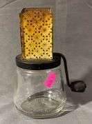 Androck Glass Base Hand-Crank Food Grinder with Metal Grating Top