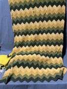 Blankets with Yellow, Green, and Black Western/Geometric Patterns