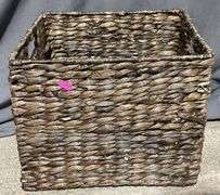 Three Handwoven Baskets in Varying Sizes and Styles