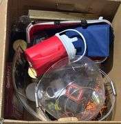 Household Items Including Candles, Egg Plate, and Alarm Clock
