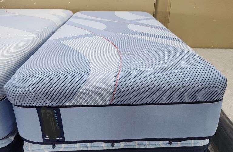 Name brand twin XL size 13" medium firm mattress floor model display or warehouse scuffed