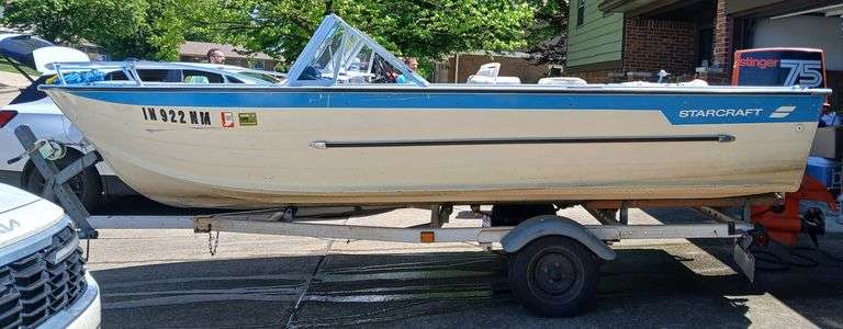 1975 Starcraft Runabout Boat 16' with 1975 Johnson 75 HP Stinger Motor - Motor was Rebuilt in 1997, Runs - Comes with Tilt Trailer, Trailer Has Title, Boat Does Not Have Title, Trailer VIN: STR3156DM756 - THIS TRAILER WILL HAVE A $25 TITLE FEE ADDED TO THE WINNING INVOICE - ALTERNATE LOCATION, BUYER WILL RECEIVE PICK UP INFORMATION WITH WINNING INVOICE