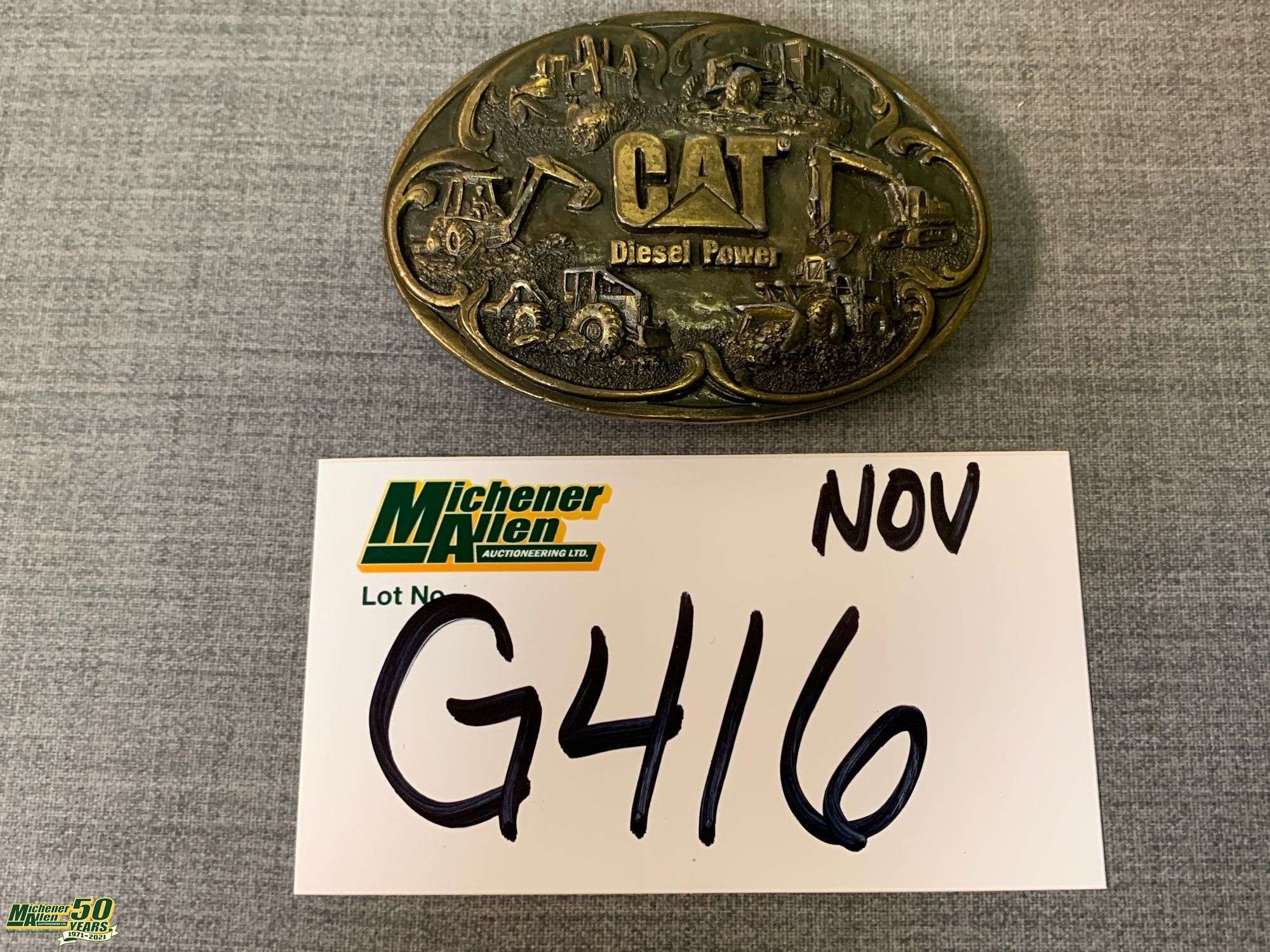 Cat belt buckle best sale