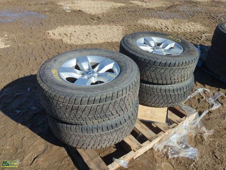 Bridgestone 265/70R17 Tires On Rims - Michener Allen Auctioneering Ltd