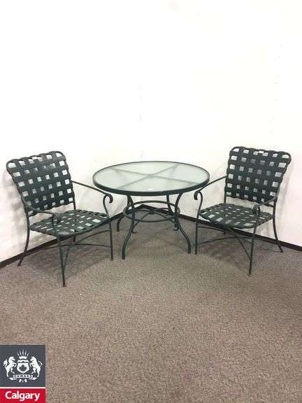 2 Green chairs and Table with glass top 42"w x 27"h