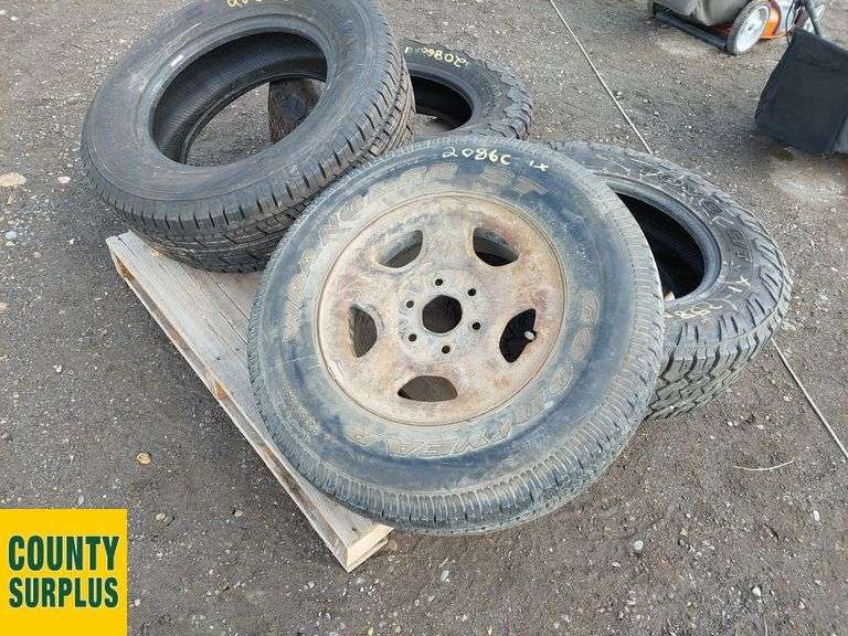4 Tires 1 Rim (1 Goodyear Wrangler ST P235/75R16, 1 General Grabber HTS ...