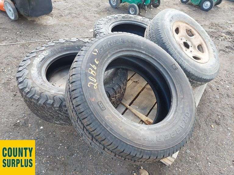 4 Tires 1 Rim (1 Goodyear Wrangler ST P235/75R16, 1 General Grabber HTS ...