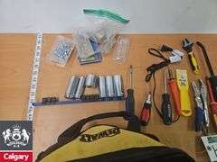 Various Tools and Supplies in Dewalt Bag