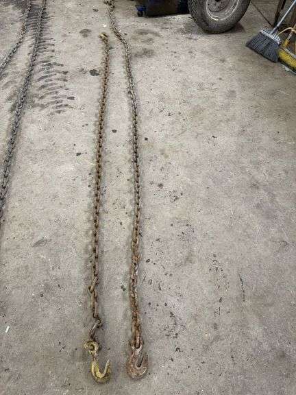(1) 12' 1/2" log chain with hooks and (1) 9' 1/2" log chain with hooks