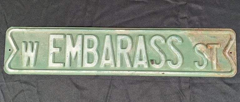 EMBOSSED STEEL ROAD SIGN W- EMBARASS ST STREET