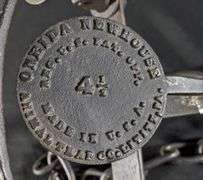 ONEIDA NEWHOUSE NO 4 1/2 WOLF TRAP CAST IRON RAISED LETTER PAN