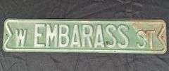EMBOSSED STEEL ROAD SIGN W- EMBARASS ST STREET