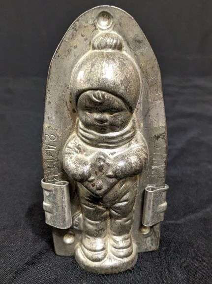 ANTIQUE CHOCOLATE MOLD CHILD WEARING WINTER CLOTHING ANTON REICHE DRESDEN