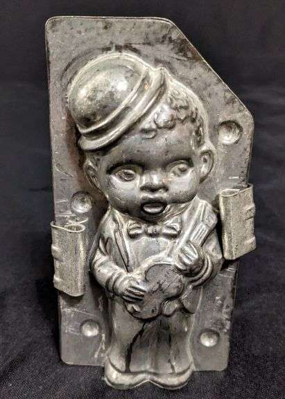 ANTIQUE CHOCOLATE MOLD AFRICAN AMERICAN BOY WITH STRING INSTRUMENT
